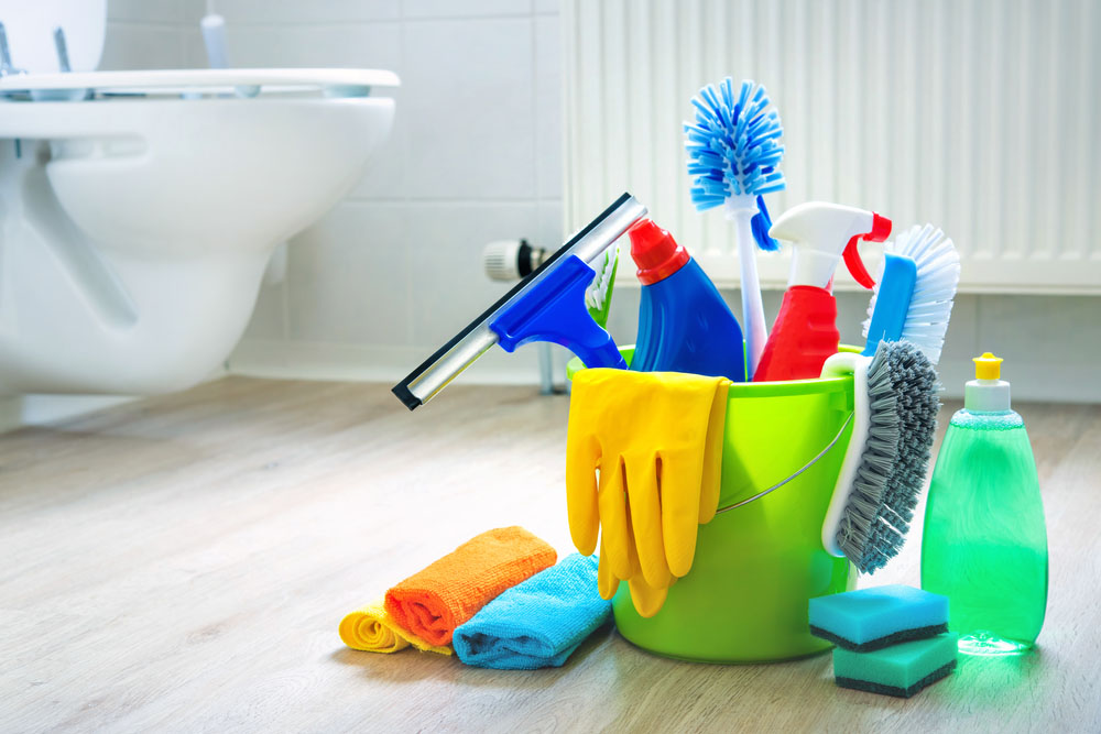 business and office cleaning services | cleaning products on bathroom floor