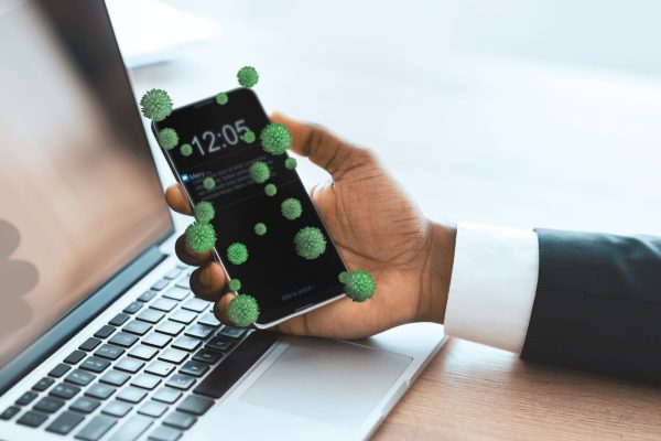 person with germs on phone